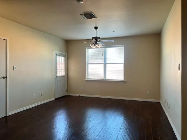 a view of a room that has a window in it