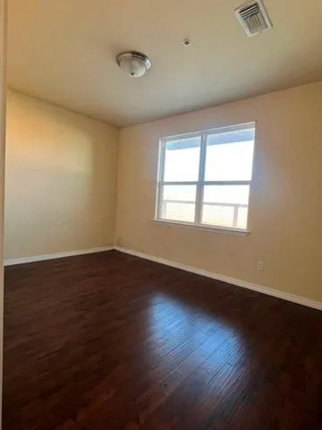a bathroom with a sink toilet and mirror