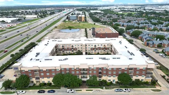 a view of city with tall buildings