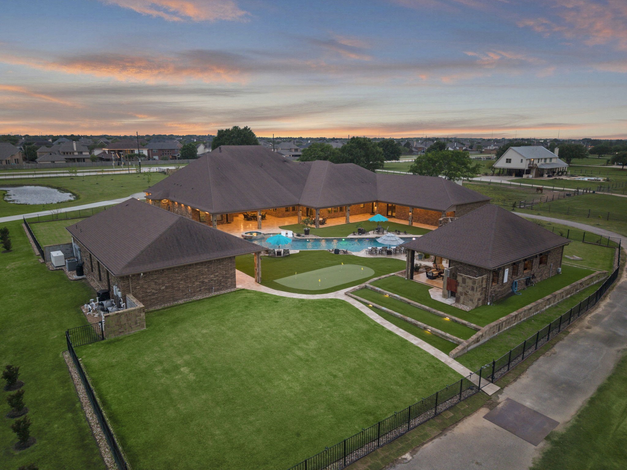 21620 Schiel Road Cypress, TX 77433 - Photo 2 of 49 Outdoor lliving at its finest with pool, slide, expanisve summer kitchen, huge outdoor living, and more