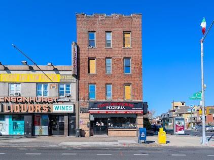7502 18th Avenue Brooklyn, NY 11214 - Photo 5 of 12 a view of street with large building and couple of cars parked in front of it