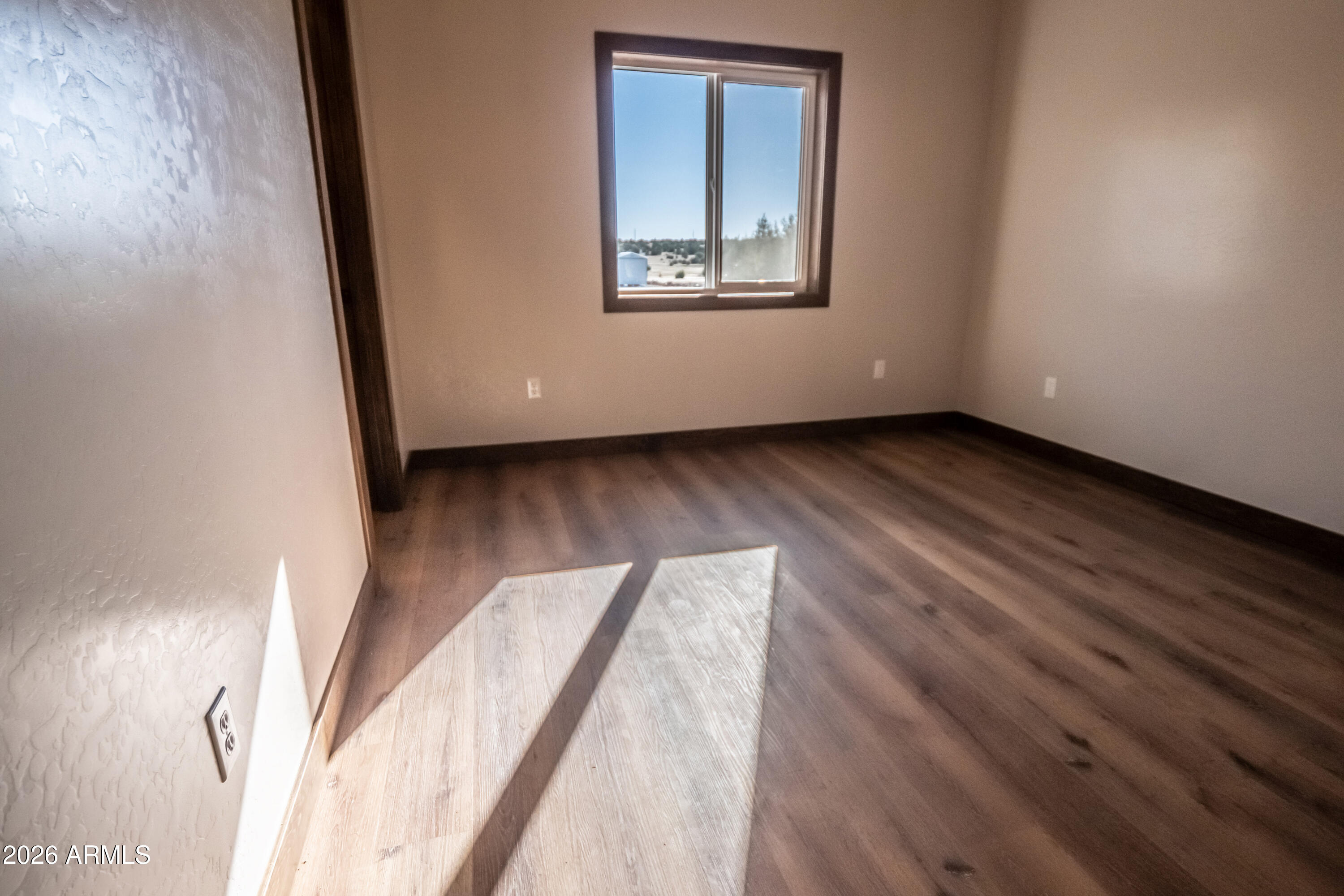2021 East Rimstone Drive Show Low, AZ 85901 - Photo 21 of 38 a view of a room with wooden floor and window