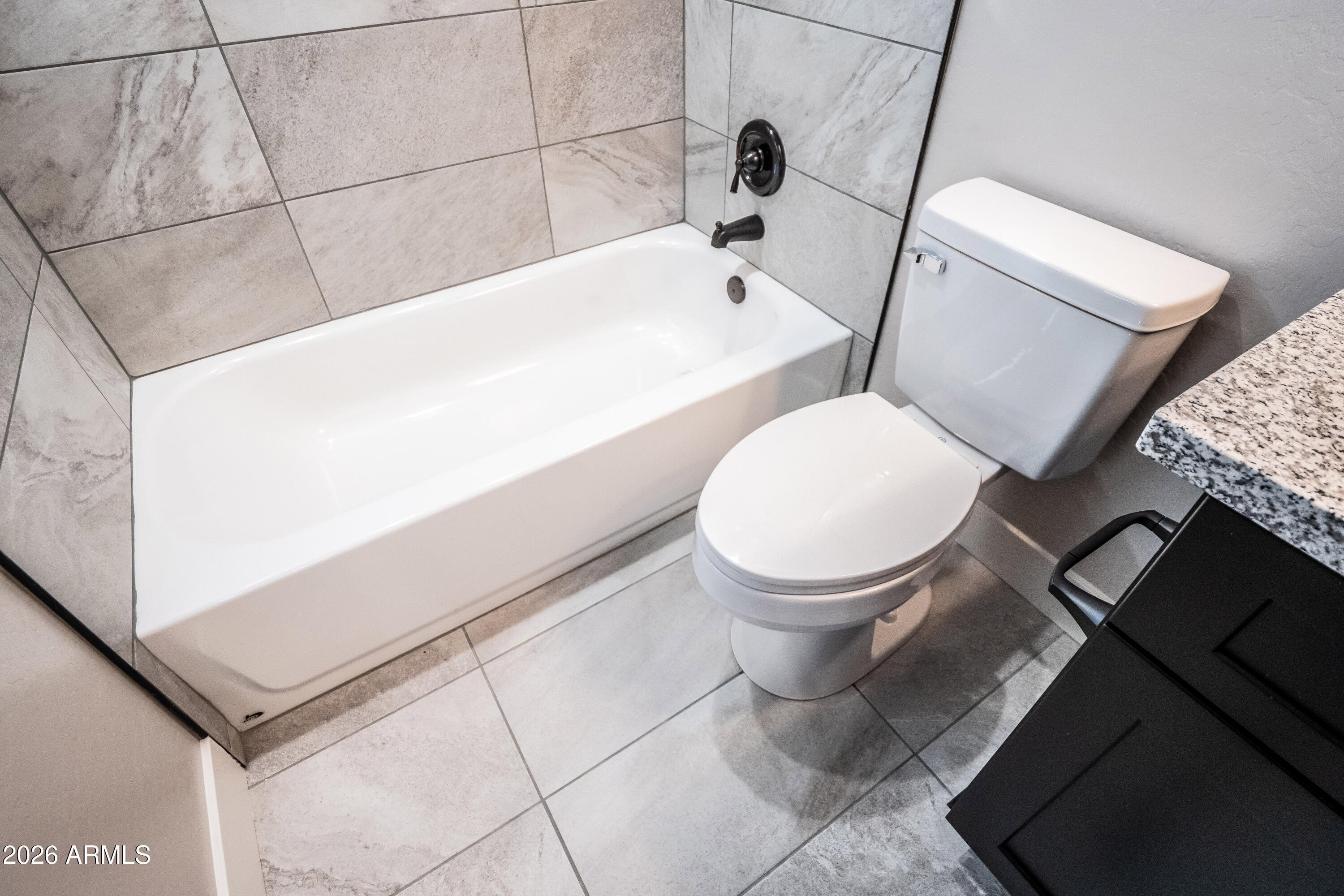 2021 East Rimstone Drive Show Low, AZ 85901 - Photo 32 of 38 a bathroom with a toilet and a bathtub