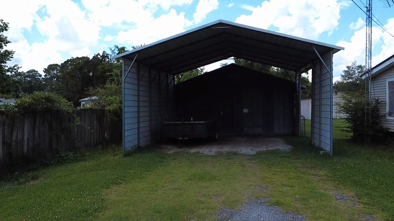 75095 Parrish Road Yulee, FL 32097 - Photo 2 of 8 a view of backyard with green space