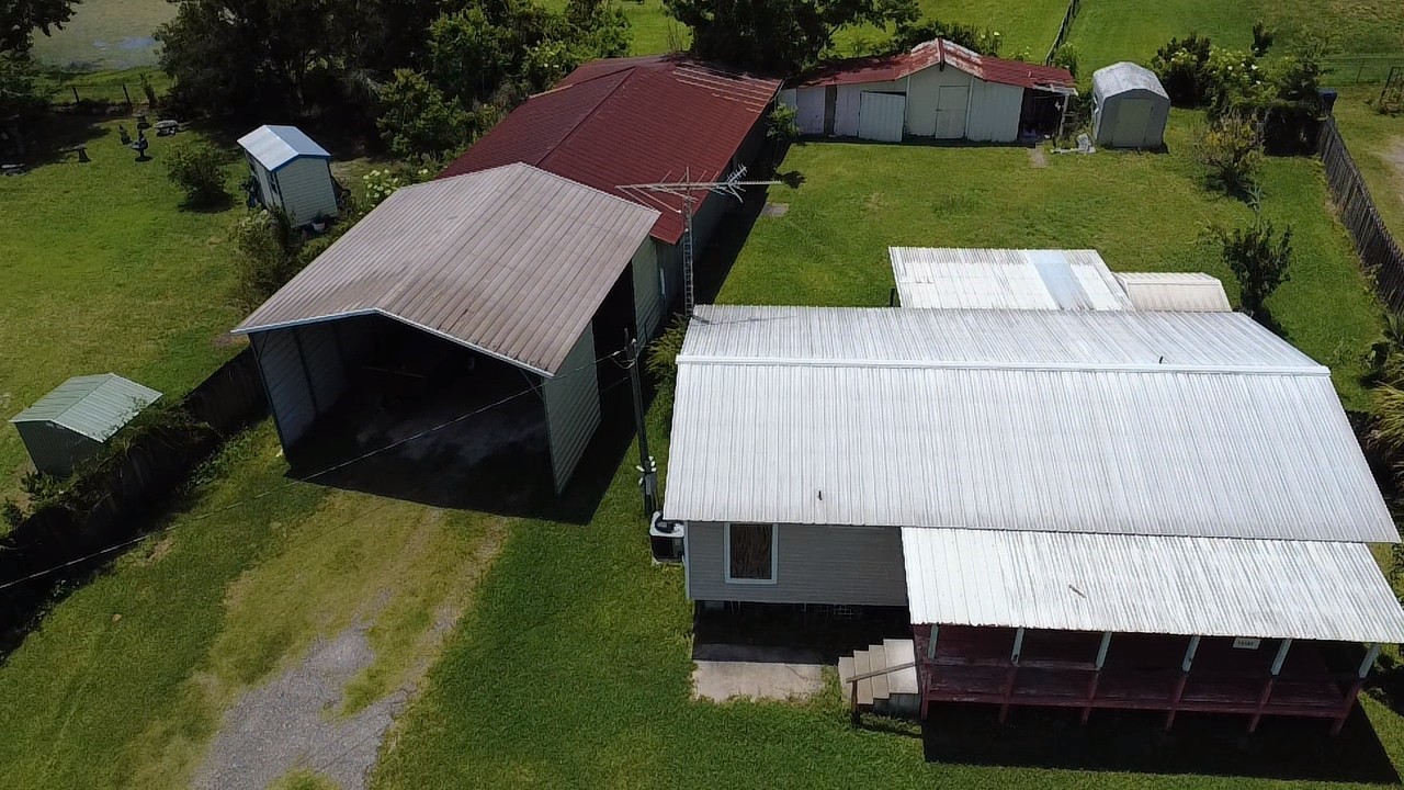 75095 Parrish Road Yulee, FL 32097 - Photo 3 of 8 a aerial view of a house