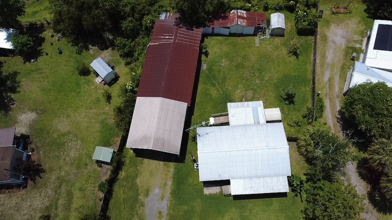 75095 Parrish Road Yulee, FL 32097 - Photo 4 of 8 an aerial view of a house with a garden