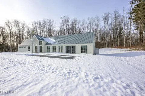 a bathroom with a sink a toilet and bathtub