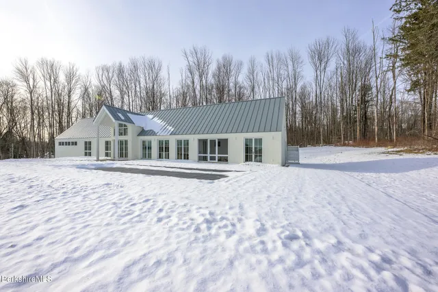 a bathroom with a sink a toilet and bathtub