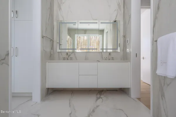 a aerial view of a house with a yard