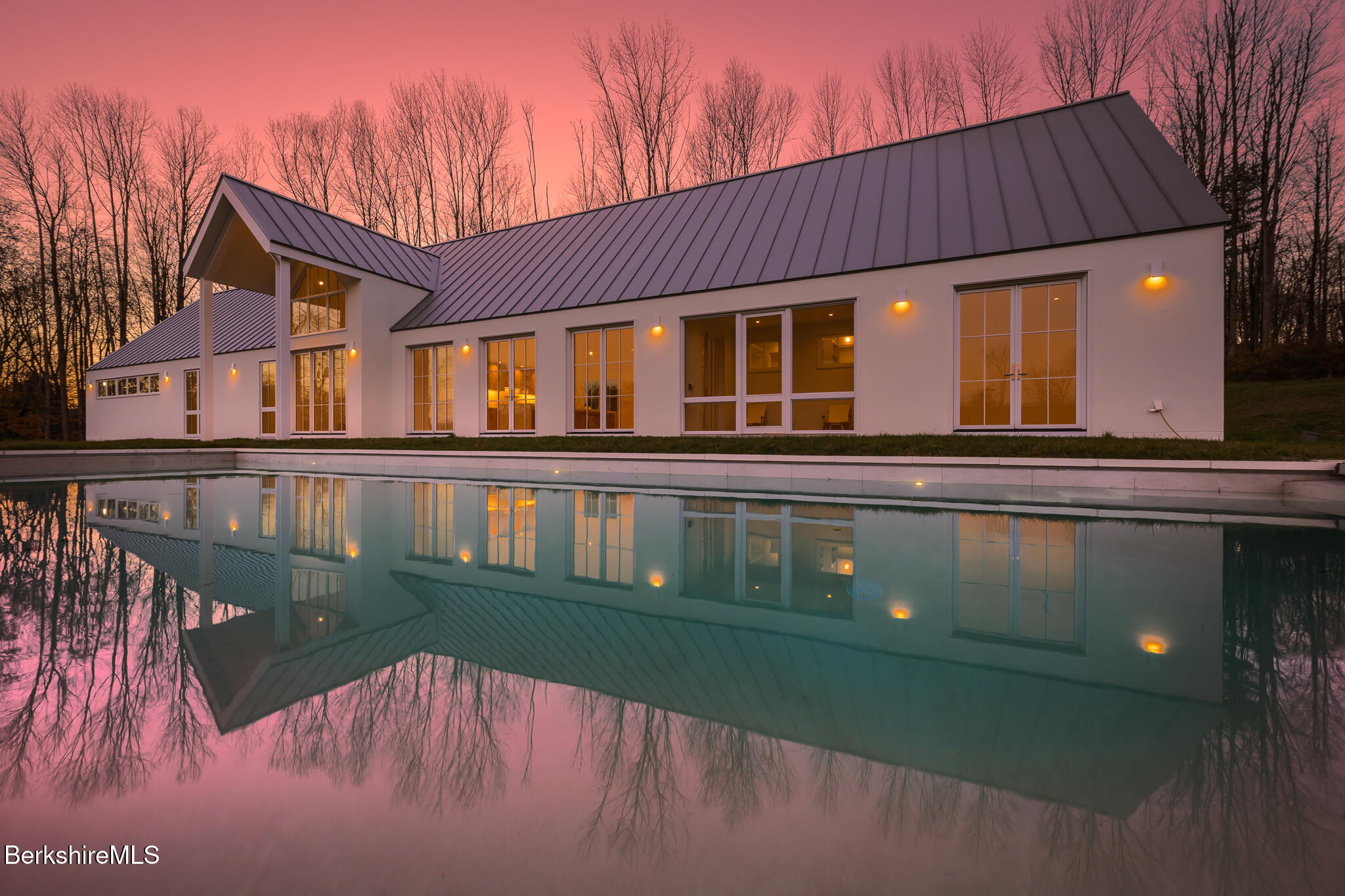 21 A Interlaken Road Stockbridge, MA 01266 - Photo 42 of 43 a view of a house with a swimming pool
