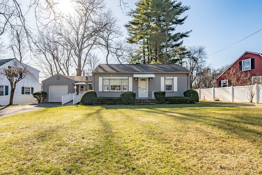 120 Welland Road Springfield, MA 01151 - Photo 1 of 36 a front view of a house with a yard and swimming pool