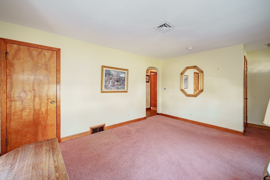 120 Welland Road Springfield, MA 01151 - Photo 17 of 36 a view of a room with window and wooden floor