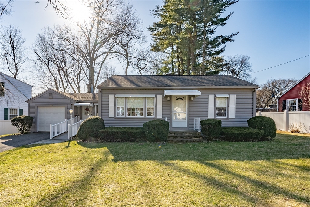 120 Welland Road Springfield, MA 01151 - Photo 3 of 36 a front view of a house with a yard