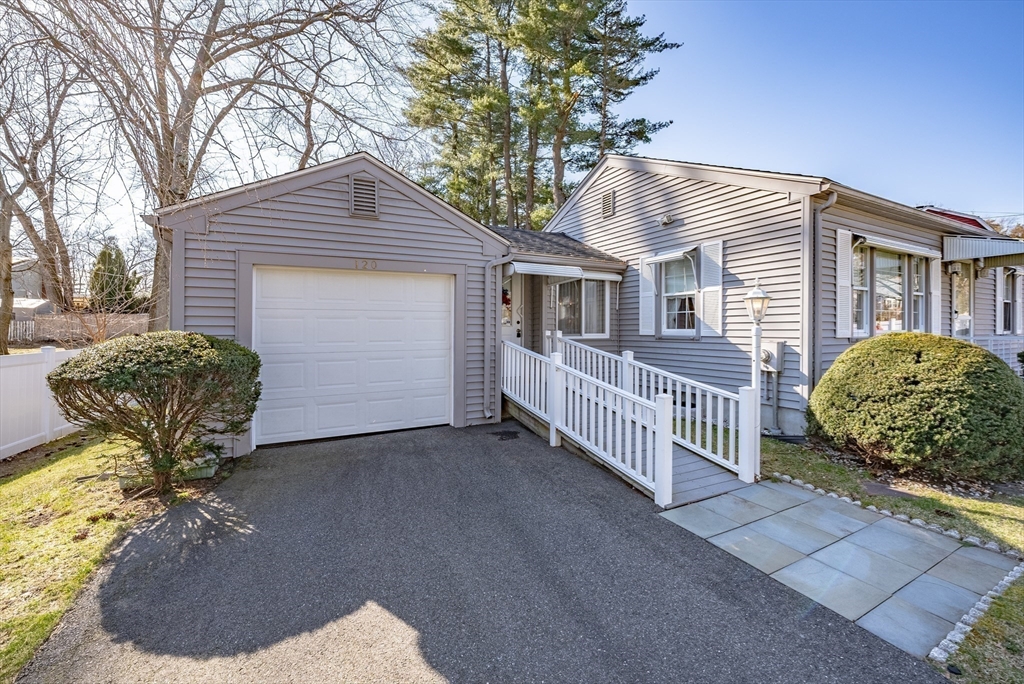 120 Welland Road Springfield, MA 01151 - Photo 5 of 36 a view of a house with a yard and garage