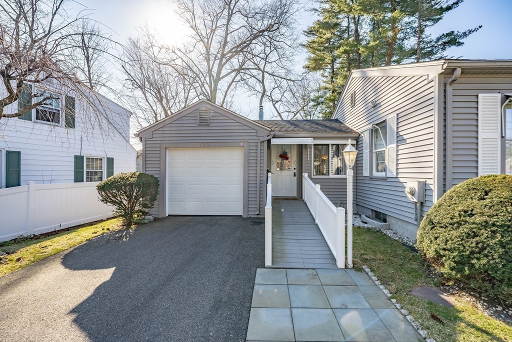 120 Welland Road Springfield, MA 01151 - Photo 6 of 36 a front view of a house with garden