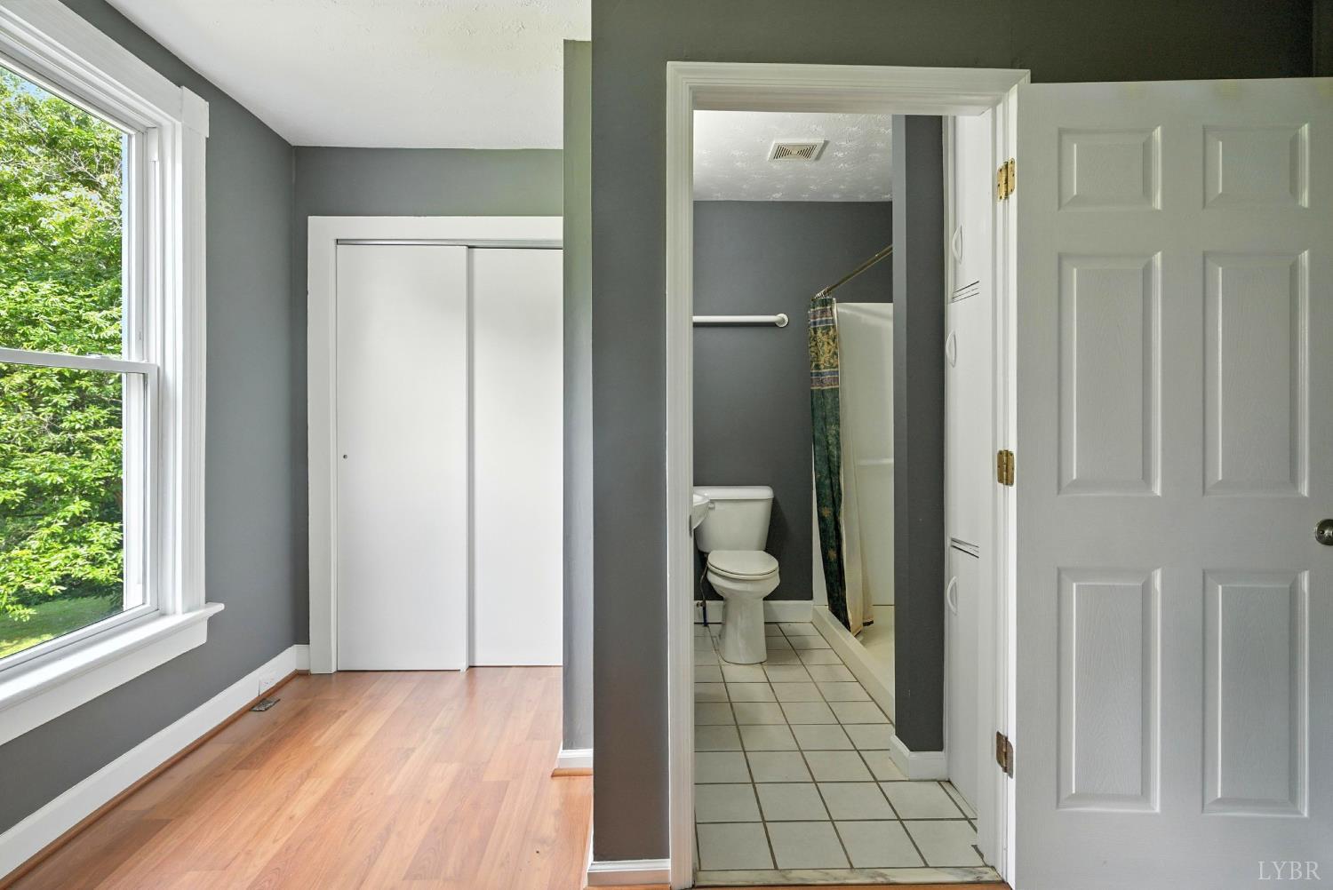 157 Old Country Road Monroe, VA 24574 - Photo 16 of 41 a view of a bathroom from a hallway