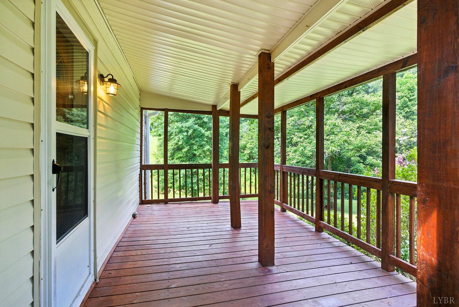 157 Old Country Road Monroe, VA 24574 - Photo 24 of 41 a view of a balcony with wooden floor