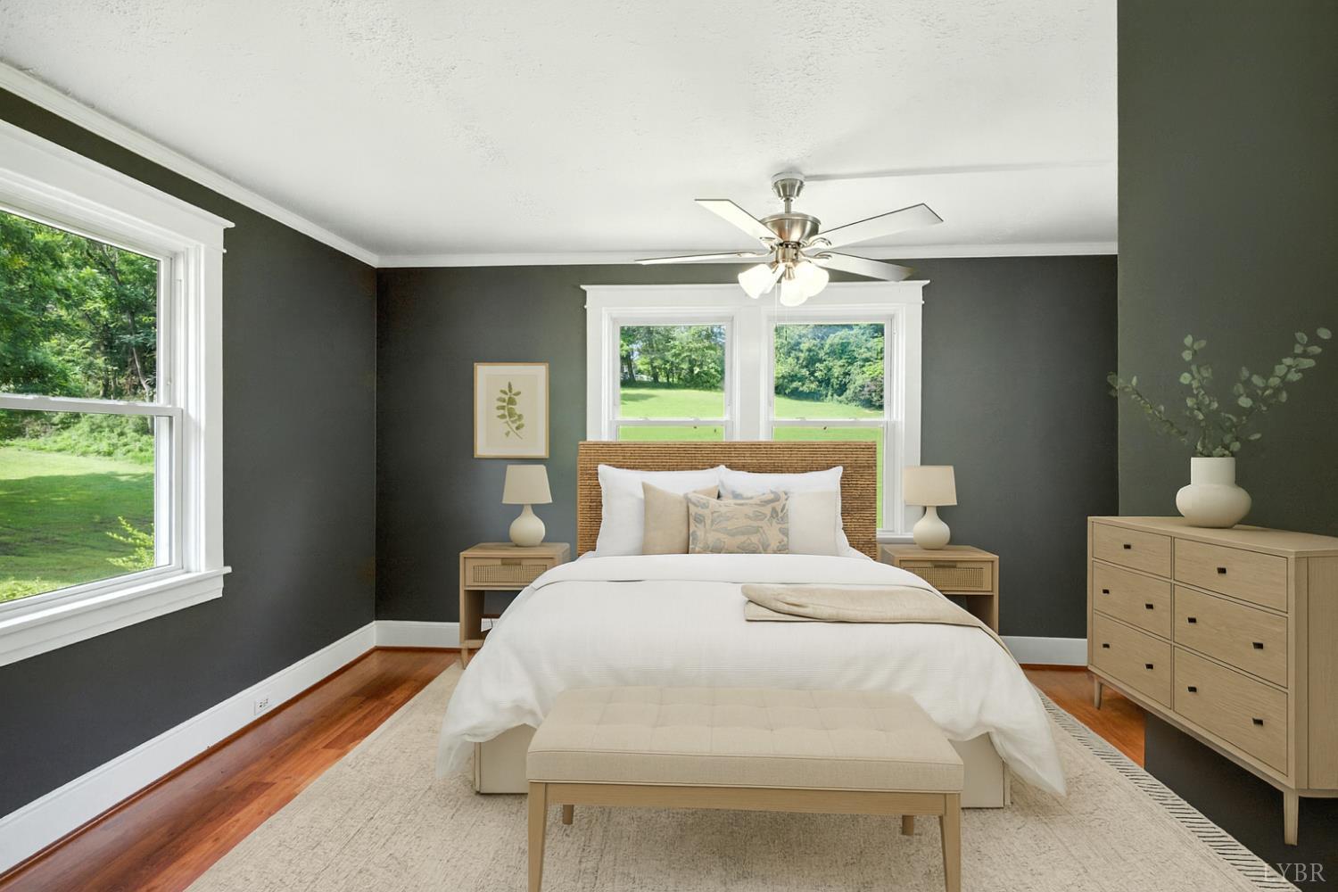 157 Old Country Road Monroe, VA 24574 - Photo 6 of 41 a bedroom with a large bed and a chandelier