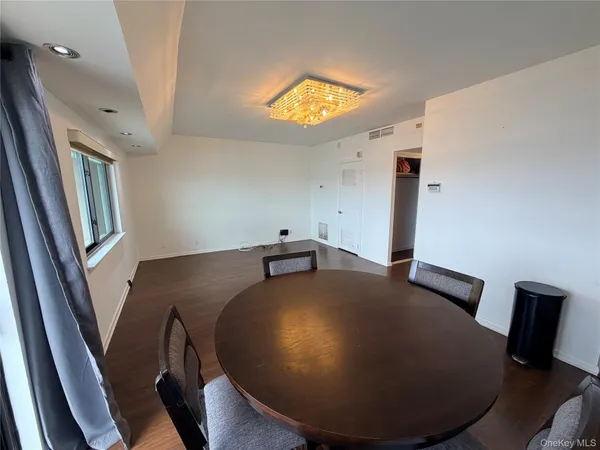 a view of a livingroom with furniture
