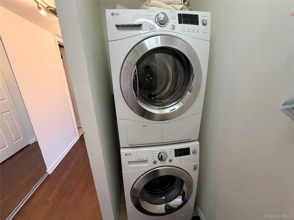 a utility room with dryer and washer