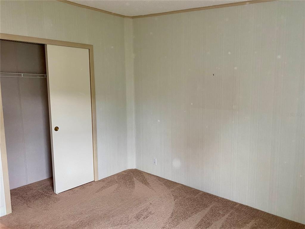 14517 Rialto Avenue Brooksville, FL 34613 - Photo 17 of 35 a view of an empty room