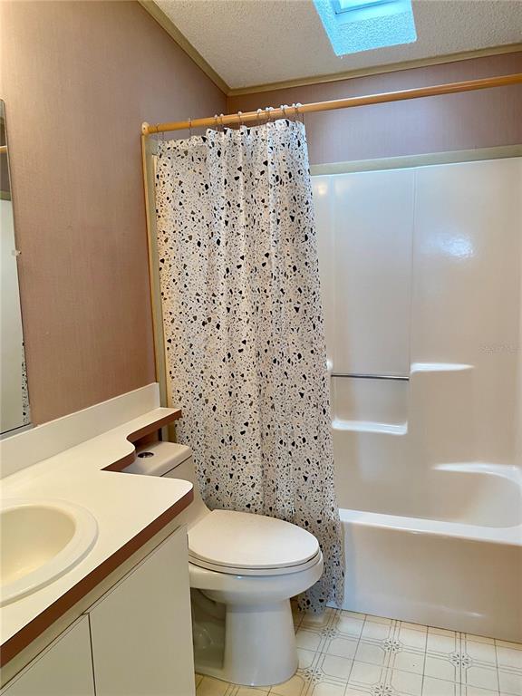 14517 Rialto Avenue Brooksville, FL 34613 - Photo 19 of 35 a bathroom with a sink toilet and shower