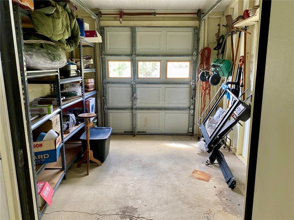 14517 Rialto Avenue Brooksville, FL 34613 - Photo 30 of 35 a view of an empty room with stairs
