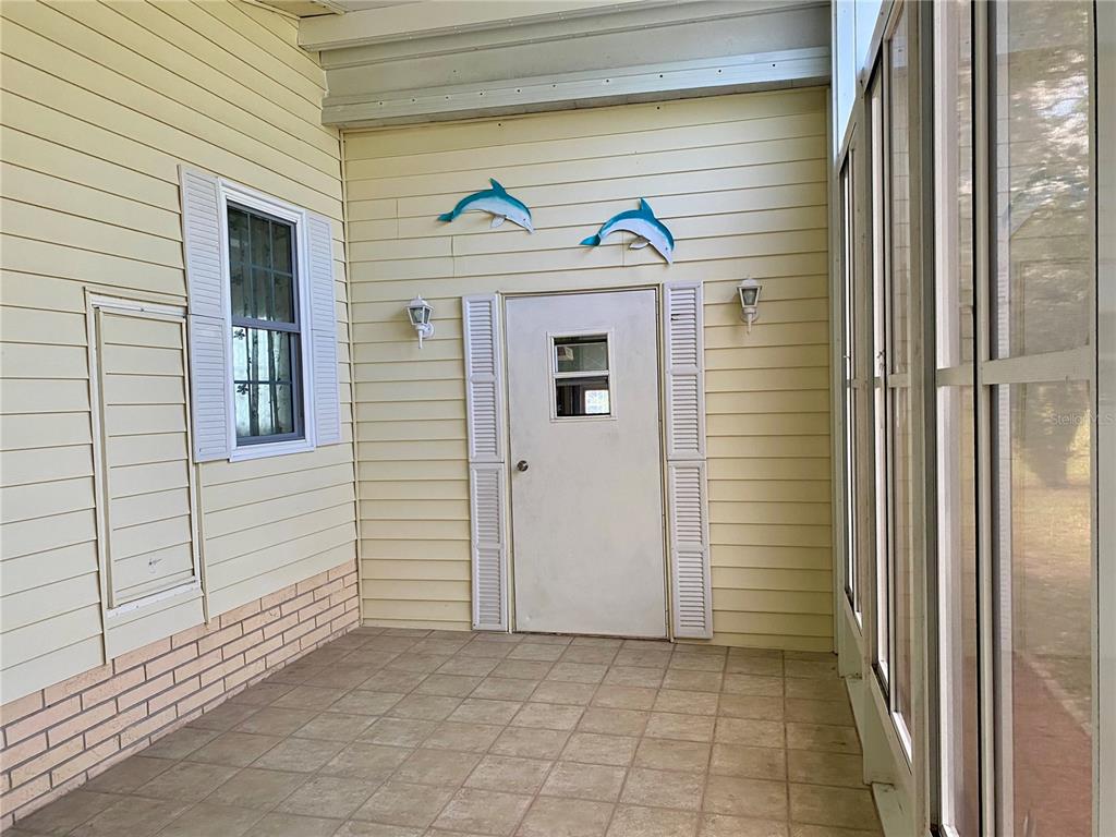 14517 Rialto Avenue Brooksville, FL 34613 - Photo 31 of 35 a view of a door of a house