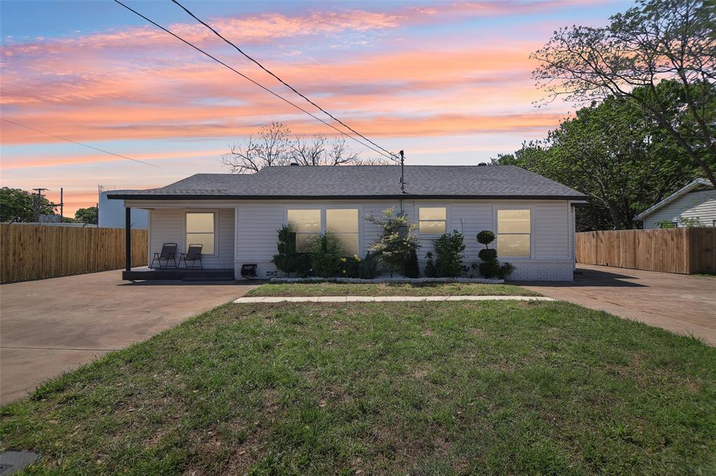 125 Souder Drive Hurst, TX 76053 - Photo 1 of 1 front view of a house with a yard