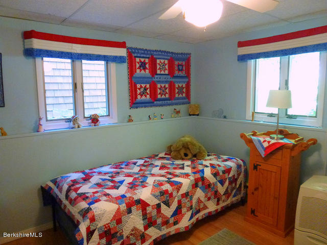 200 Whitman Road Hancock, MA 01267 - Photo 22 of 25 a bedroom with a bed and window