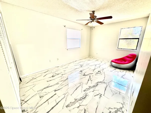 a view of a room with a window