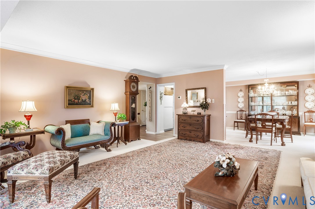 2956 Hathaway Road, Unit U301 Richmond, VA 23225 - Photo 12 of 36 a living room with furniture and wooden floor