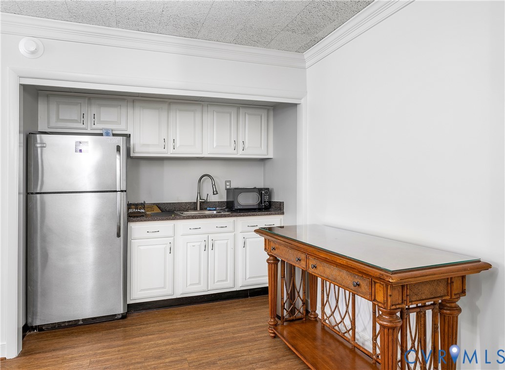2956 Hathaway Road, Unit U301 Richmond, VA 23225 - Photo 32 of 36 a kitchen with stainless steel appliances granite countertop a refrigerator a stove and a sink