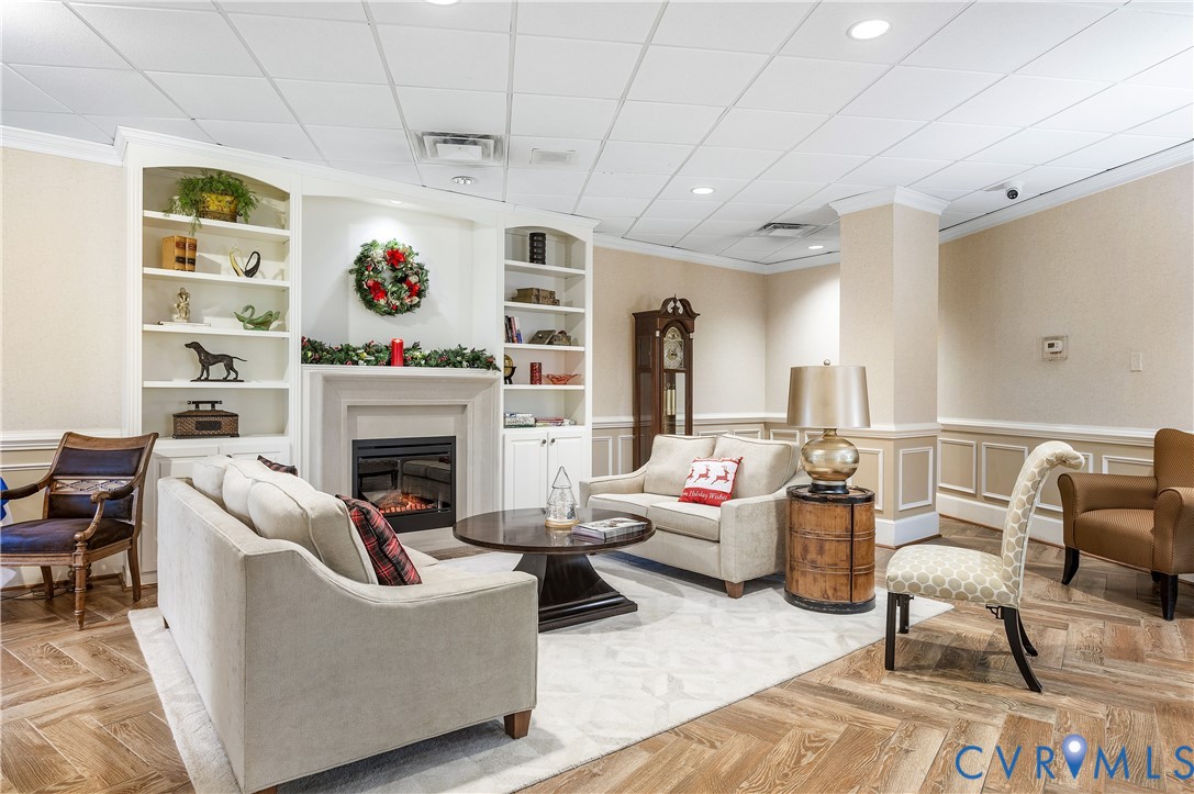 2956 Hathaway Road, Unit U301 Richmond, VA 23225 - Photo 5 of 36 a living room with furniture and a fireplace