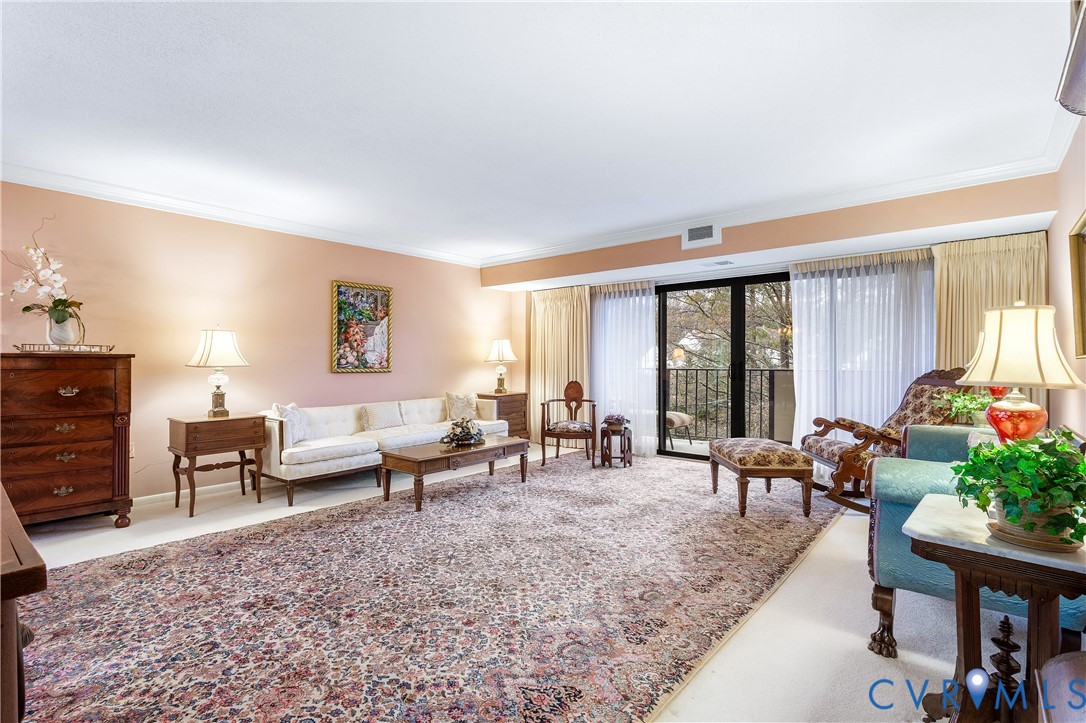2956 Hathaway Road, Unit U301 Richmond, VA 23225 - Photo 10 of 36 a living room with furniture and large windows