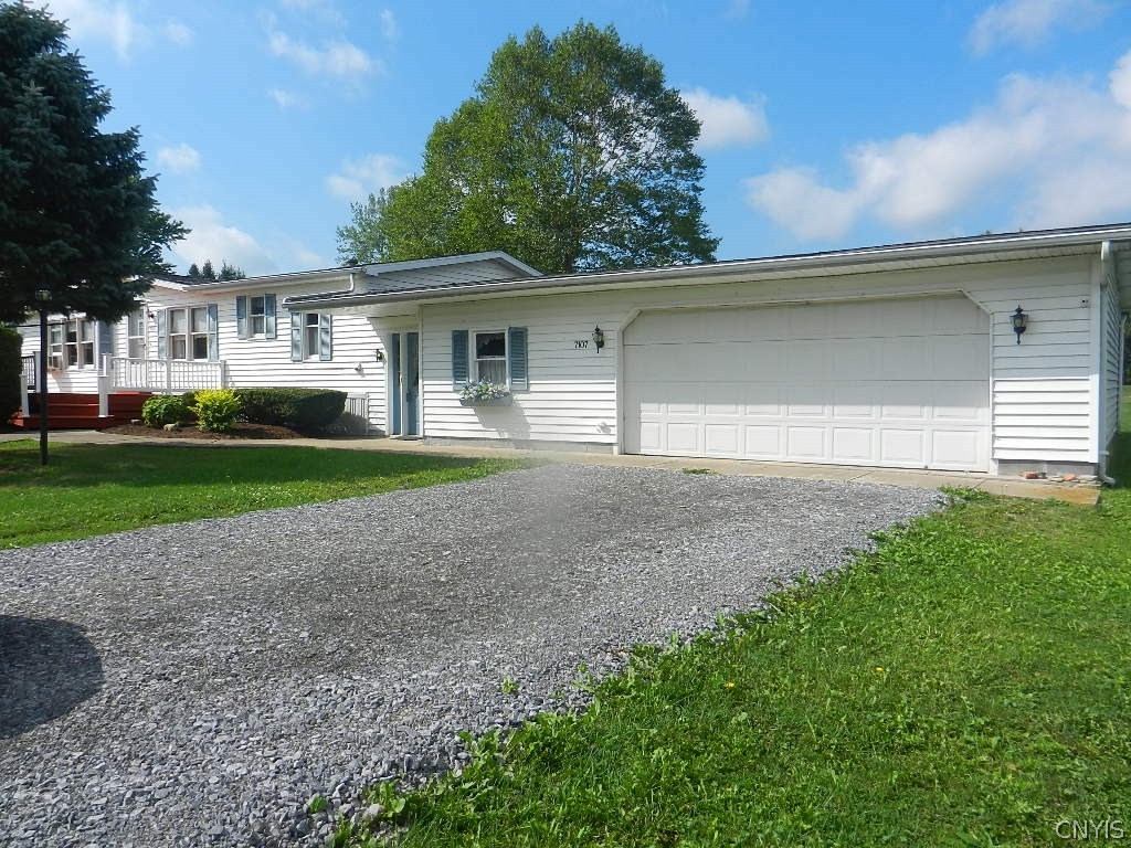 7107 Beech Tree Road Throop, NY 13021 - Photo 1 of 1 Exterior Front - Vinyl Siding - 24" x 34 ' garage