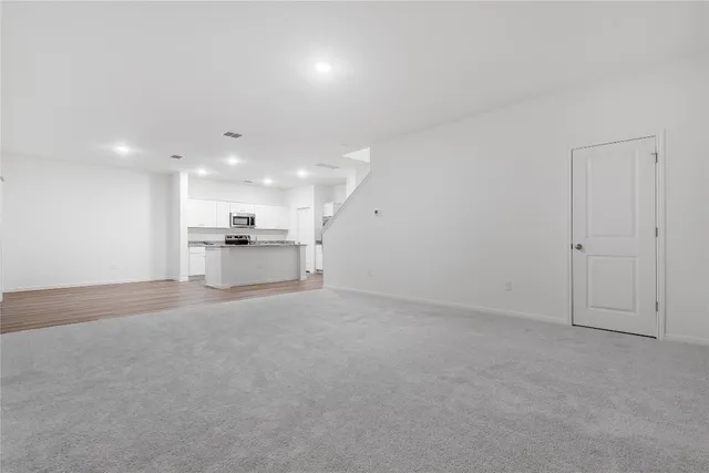 an empty room with a bench