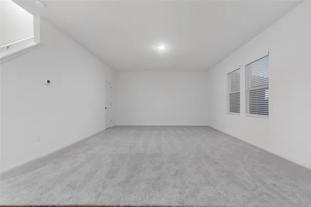 a view of a kitchen with a sink and a stove top oven