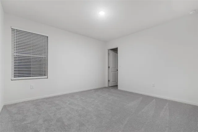 a view of a room that has a window in it