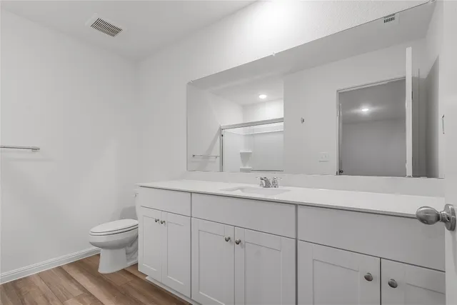 a view of an empty walk in closet