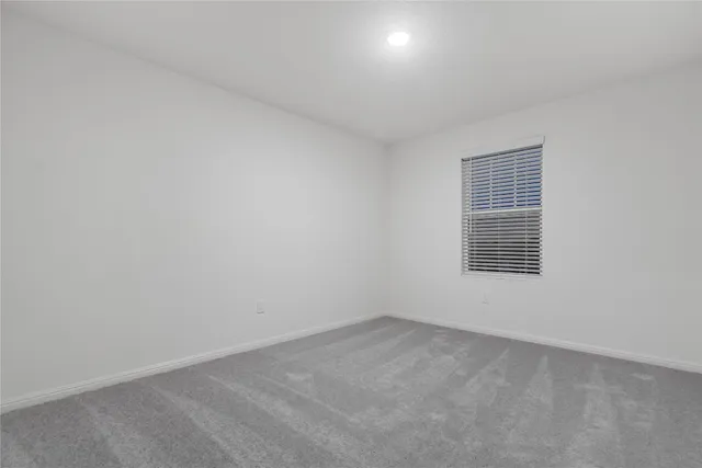 a bathroom with a sink toilet a mirror and shower