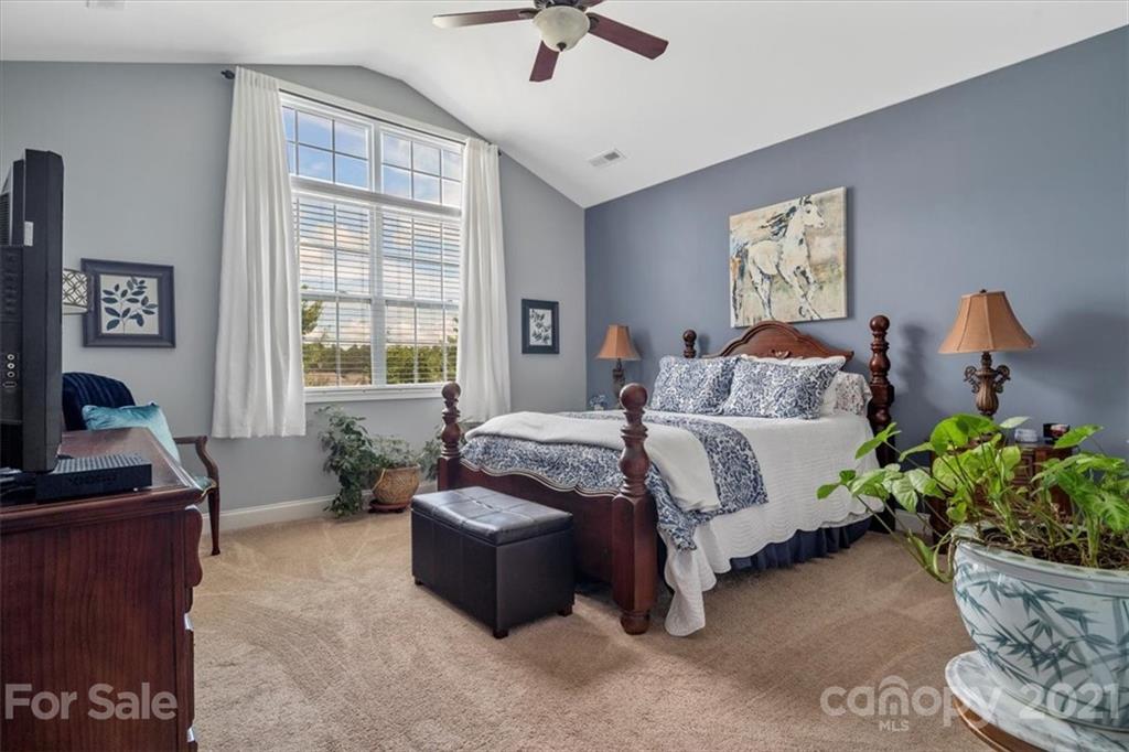 79067 Ridgehaven Road Lancaster, SC 29720 - Photo 24 of 38 a bedroom with furniture and a window
