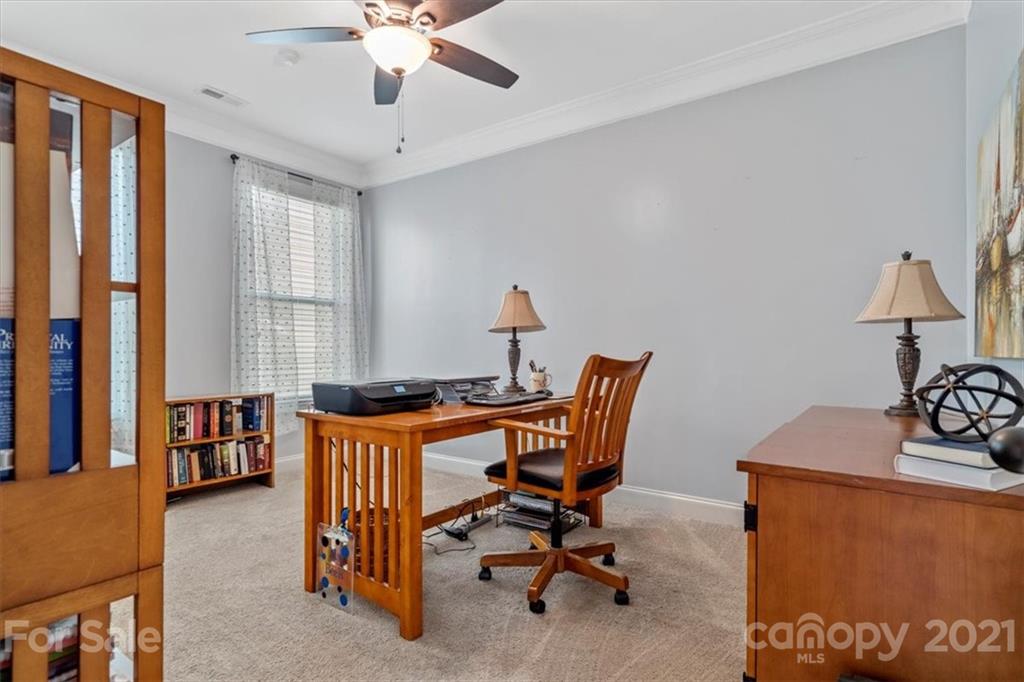 79067 Ridgehaven Road Lancaster, SC 29720 - Photo 25 of 38 a view of a workspace with furniture and a window