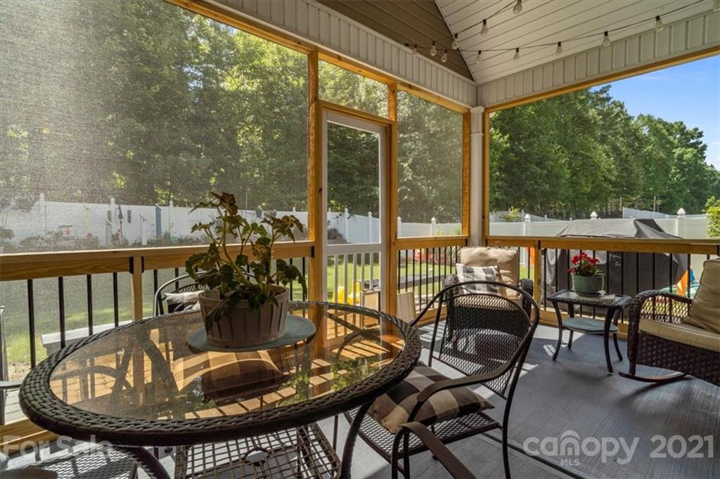 79067 Ridgehaven Road Lancaster, SC 29720 - Photo 27 of 38 a view of a chairs and table in the patio