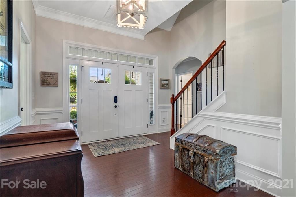 79067 Ridgehaven Road Lancaster, SC 29720 - Photo 5 of 38 a living room with furniture and a chandelier