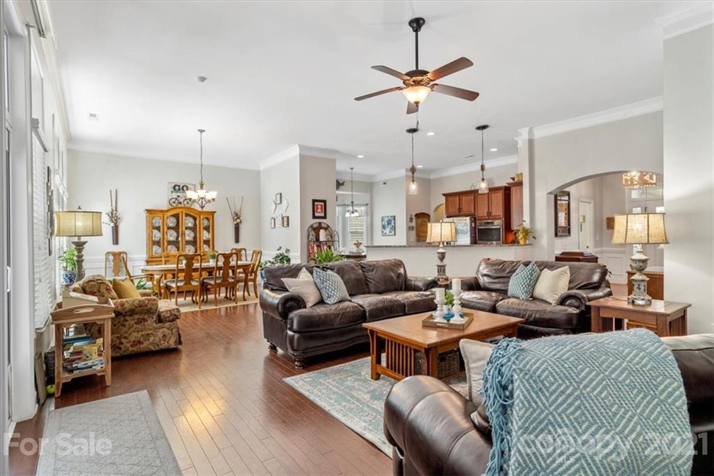 79067 Ridgehaven Road Lancaster, SC 29720 - Photo 7 of 38 a living room with furniture kitchen view and a chandelier