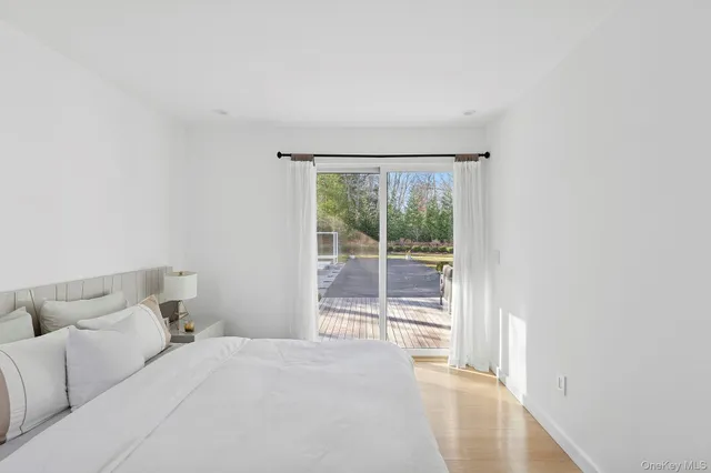 a bathroom with a bathtub and a sink