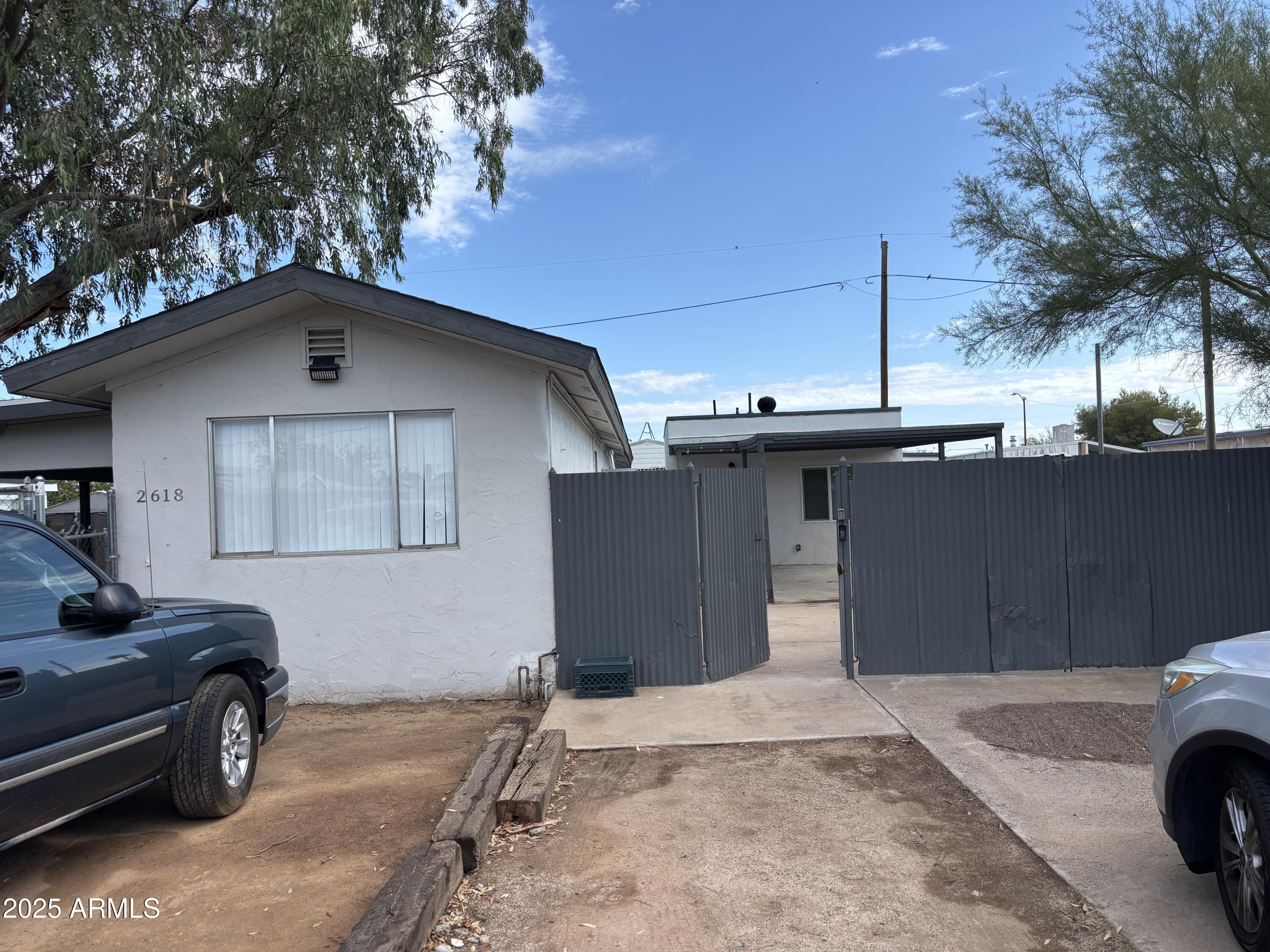a car parked in front of a house
