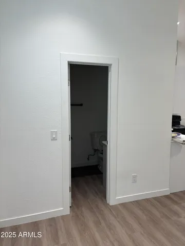 a view of a room that has a bench in it