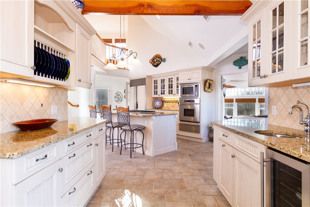1507 West Side Road Block Island, RI 02807 - Photo 6 of 40 A gourmet kitchen with wet bar area and wine chiller!